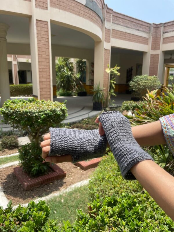 Stay warm and stylish with our handmade fingerless crochet gloves!